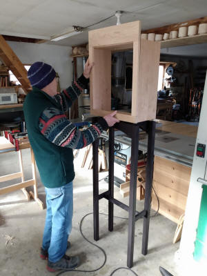 John Rogers with clock case in progress