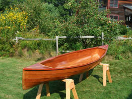 Completed canoe on saw horses