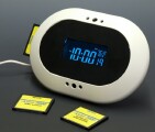 Alarm clock with programed sounds