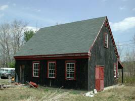 Barn in the summer before solar collector shed