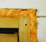 Foam insulation around door frame