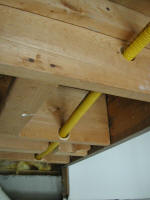 1 inch propane line through ceiling beams